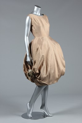 Lot 96 - An early Pierre Cardin slubbed beige silk...