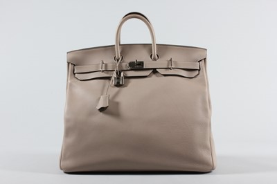 Lot 12 - An Hermès gris tourterelle clemence leather...