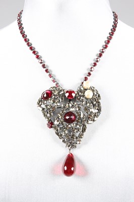 Lot 22 - An Yves Saint Laurent heart-pendant...