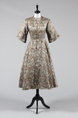 Lot 58 - A Paul Poiret 'Patineur' brocaded satin...