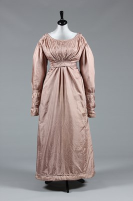 Lot 42 - A fine old-rose silk walking dress, 1820s,...