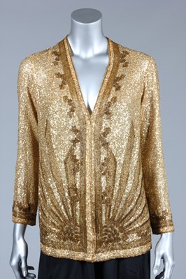 Lot 72 - An art-deco gold sequined and beaded evening...