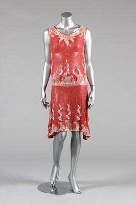 Lot 57 - A good coral-pink muslin beaded flapper dress,...