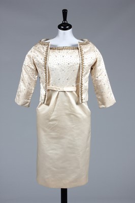 Lot 101 - A Christian Dior London ivory satin cocktail...