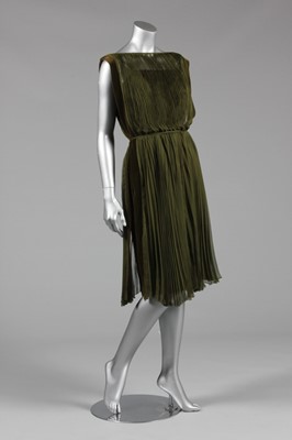 Lot 94 - A Jean Dessès sage green pleated chiffon...