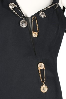 Lot 227 - A Gianni Versace 'Safety Pin' dress,...