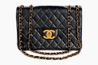 Lot 17 - A Chanel quilted leather jumbo flap bag, late...