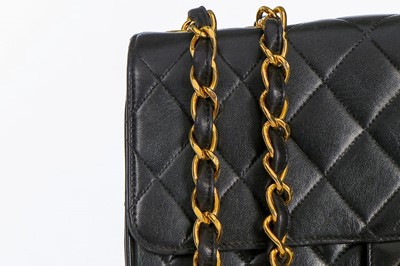 Lot 11 - A Chanel quilted leather jumbo flap bag, late...