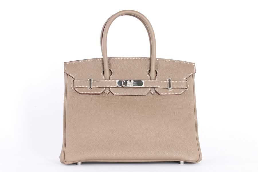 Lot 55 - An Hermès étoupe togo leather Birkin 30, 2016,...