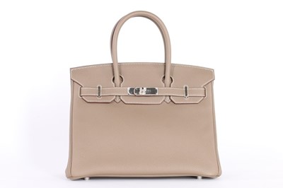 Lot 55 - An Hermès étoupe togo leather Birkin 30, 2016,...