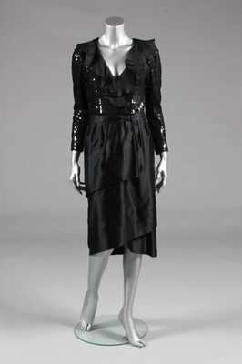 Lot 199 - A Nina Ricci black sequin and satin cocktail...