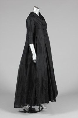Lot 82 - A Jacques Heim black organza evening coat,...
