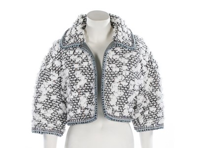 Lot 47 - A Chanel silver tweed ensemble trimmed with...