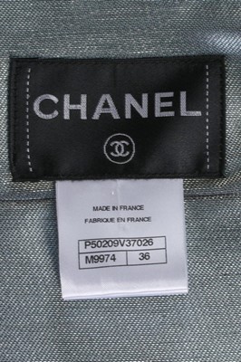 Lot 47 - A Chanel silver tweed ensemble trimmed with...