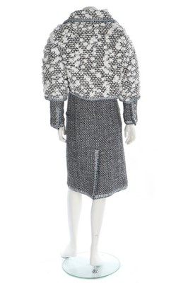Lot 47 - A Chanel silver tweed ensemble trimmed with...