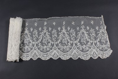Lot 415 - Two good deep Brussels mixed lace dress...