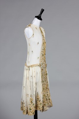 Lot 130 - An ivory tulle and beetle-wing adorned dress,...