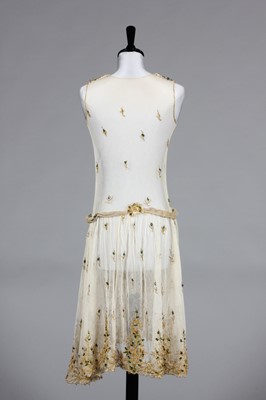 Lot 130 - An ivory tulle and beetle-wing adorned dress,...