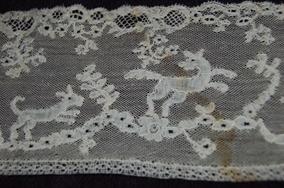 Lot 445 - A good Mechlin bobbin edging worked with a fox...
