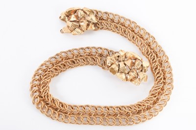 Lot 65 - An Yves Saint Laurent belt, with 'gold nugget'...