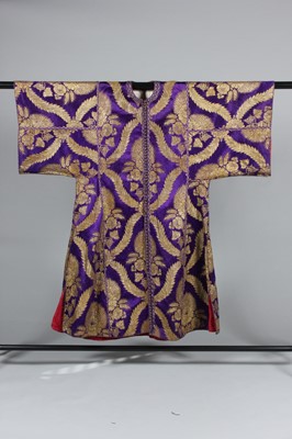 Lot 390 - A brocaded purple satin robe, probably North...
