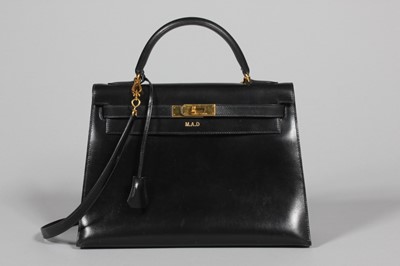 Lot 46 - An Hermès black box calf leather Kelly bag,...
