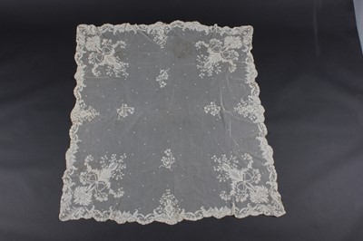 Lot 404 - A Carrickmacross darned net bridal veil, circa...