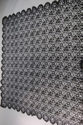 Lot 428 - A pusher imitation black Chantilly shawl,...