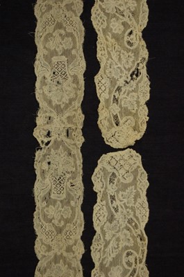 Lot 430 - A pair of Mechlin lappets, circa 1750, worked...