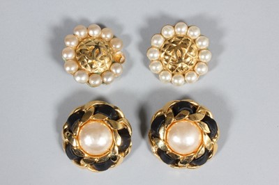 Lot 32 - Two pairs of Chanel earrings, both signed, one...