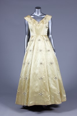 Lot 43 - A Paquin primrose yellow satin ball gown, 1954-...