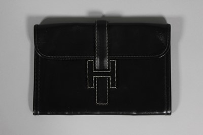 Lot 47 - An Hermès black box calf leather clutch bag,...