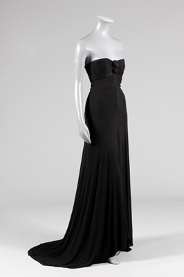 Lot 120 - A fine Madame Grès black silk jersey sheath,...