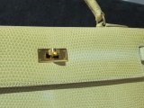 Lot 9 - An Hermès caramel lizard Kelly bag, 1996,...