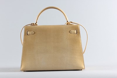 Lot 9 - An Hermès caramel lizard Kelly bag, 1996,...
