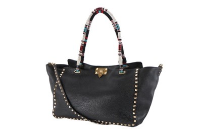 Lot 75 - A Valentino Rockstud beaded black leather tote,...
