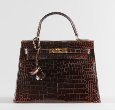 Lot 14 - An Hermès brown crocodile Kelly bag, 1974,...