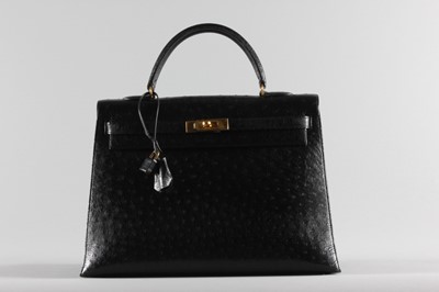 Lot 7 - An Hermès black ostrich Kelly bag, circa 1970,...