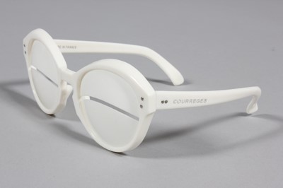 Lot 26 - A pair of Courrges white plastic sunglasses,...