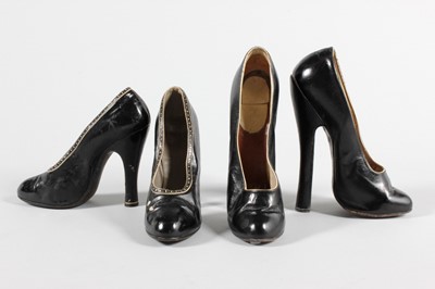 Lot 23 - Two pairs of black patent leather fetish shoes,...