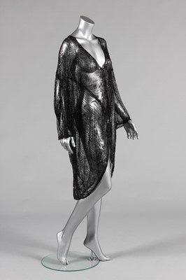 Lot 45 - A black beaded tulle opera coat, mid 1920s,...