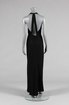 Lot 61 - A Lucien Lelong black silk crêpe evening gown...