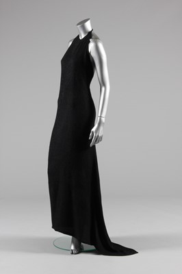 Lot 52 - A Schiaparelli black satin-backed textured...