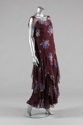 Lot 63 - A Maison Worth couture printed wine chiffon...