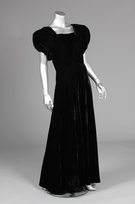 Lot 58 - A Madeleine Vionnet black velvet bias-cut gown,...