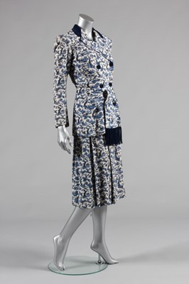 Lot 73 - A Carven summer suit, circa 1945, woven blue...