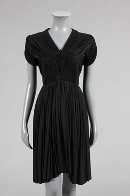 Lot 71 - A Madame Grès couture black draped jersey...