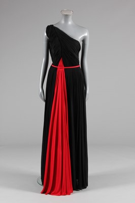 Lot 72 - A Madame Grès couture asymmetric draped black...