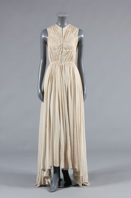Lot 70 - A Madame Grès ivory silk evening gown, late...