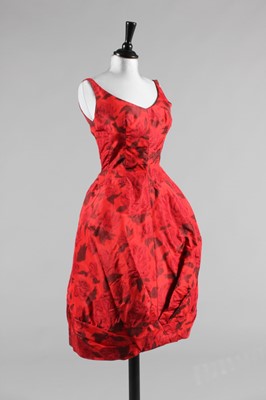 Lot 97 - A Givenchy couture red chiné taffeta cocktail...